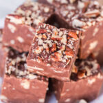 A close up of easy fudge recipe on a white dish