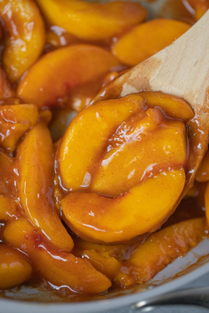 Close-up of thick pie filling on a spoon.